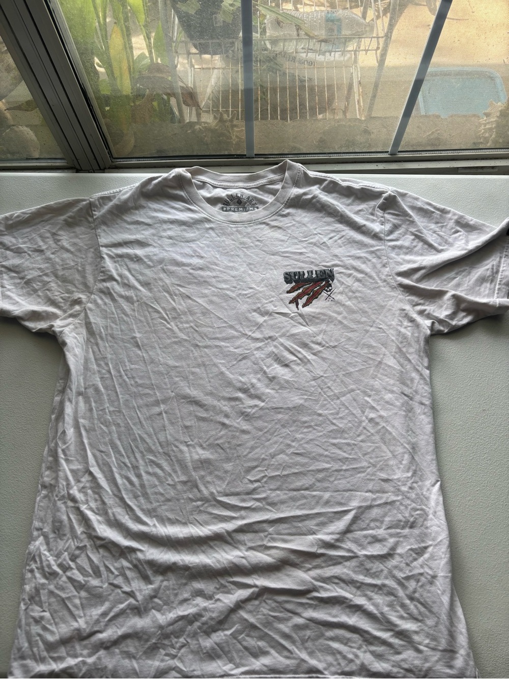 White Short-Sleeve Men’s Graphic Tee with Small Chest Print